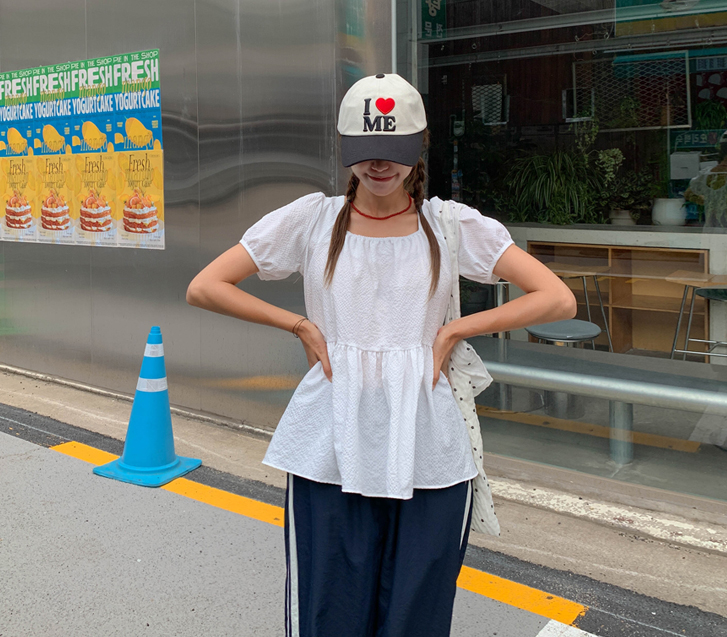 モアエンボシアサーカシャーリング半そでブラウス